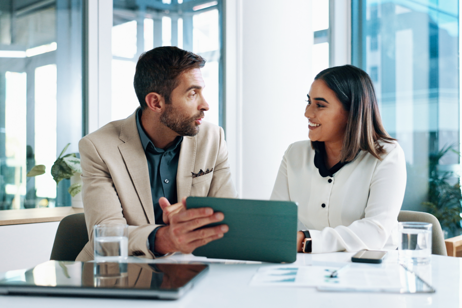 Couple chatting with a tablet